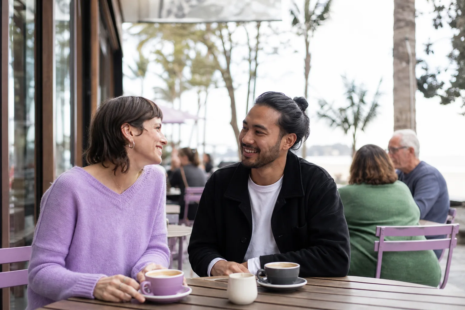 Two people talking over coffee in Basingstoke town centre